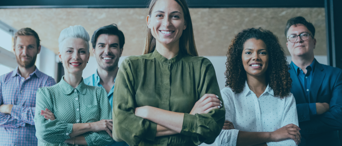 3 men and 3 woman smiling and folding arms while facing the camera