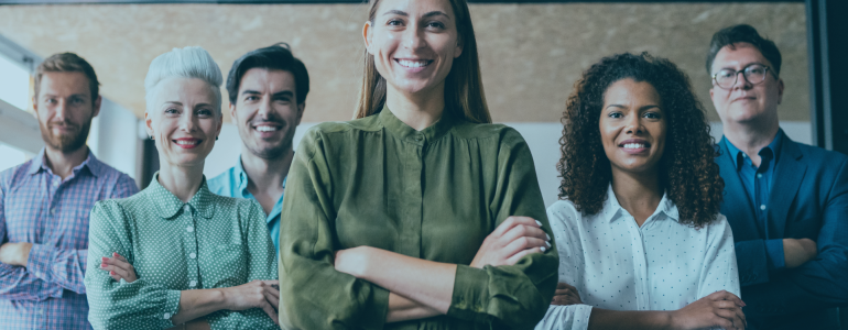 3 men and 3 woman smiling and folding arms while facing the camera